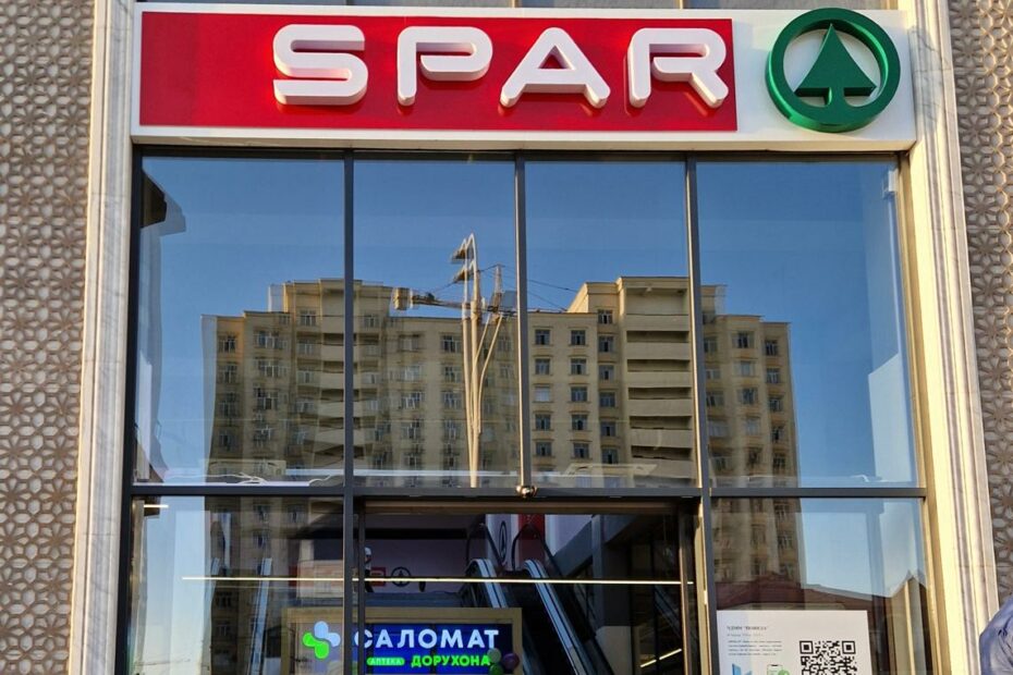 Entrance to the first SPAR supermarket in Tajikistan in Dushanbe, with the SPAR sign above the glass doors