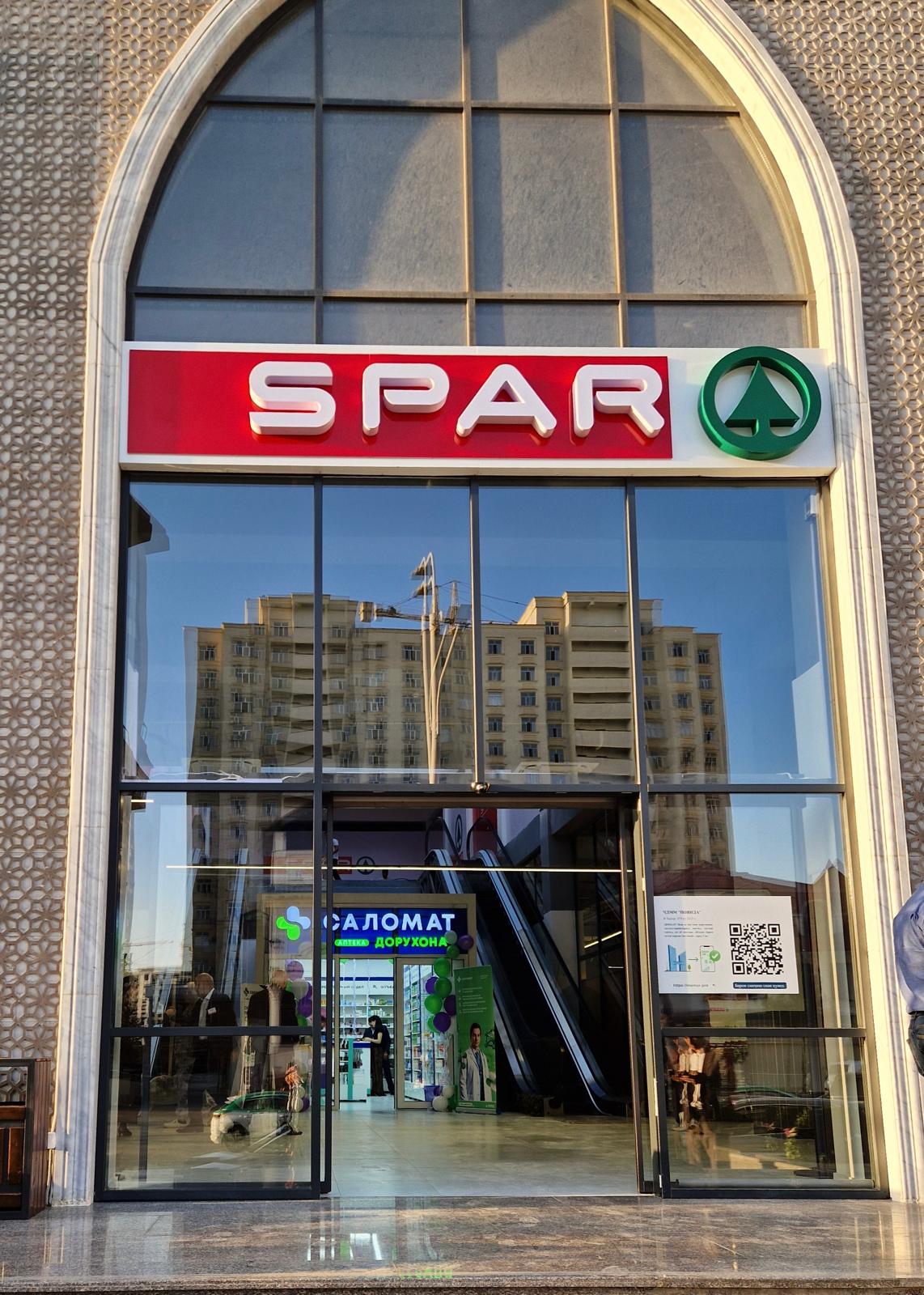 Entrance to the first SPAR supermarket in Tajikistan in Dushanbe, with the SPAR sign above the glass doors